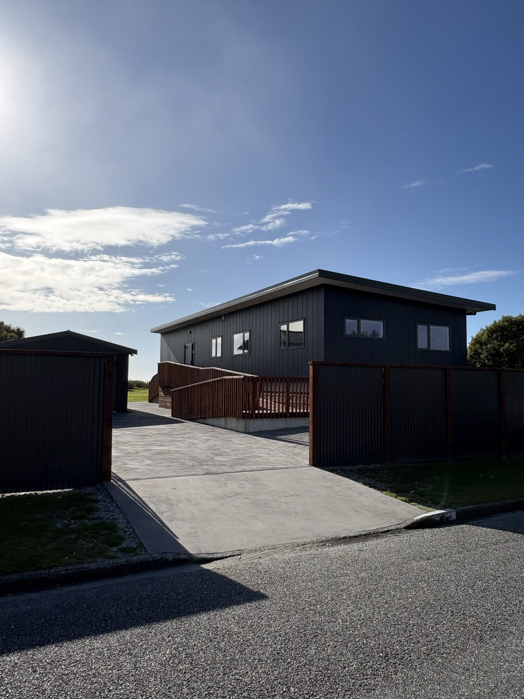 Two-storey new build with timber balcony